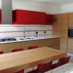 In The Wooden Red In The Kitchen With Wooden Kitchen Cabinets And The White Baksplash Kitchen  Modern Kitchen Cabinets With Additional Decorations 