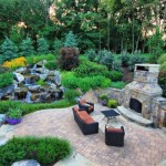 Open Space Including Remarkable Open Space Lounge Design Including Sofas And Black Table Near Fireplace On Stoney Mantel With Trees And Foilage In Garden Garden  Backyard Garden Waterfalls As Beautiful Garden Landscaping 