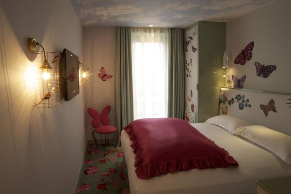Bedroom Located Versa Small Bedroom Located Inside Vice Versa Hotel Paris Completed With White Bed And Colorful Butterfly Wall Decal House Designs  Hotel Interior Design Some Modern Hotel In Paris 