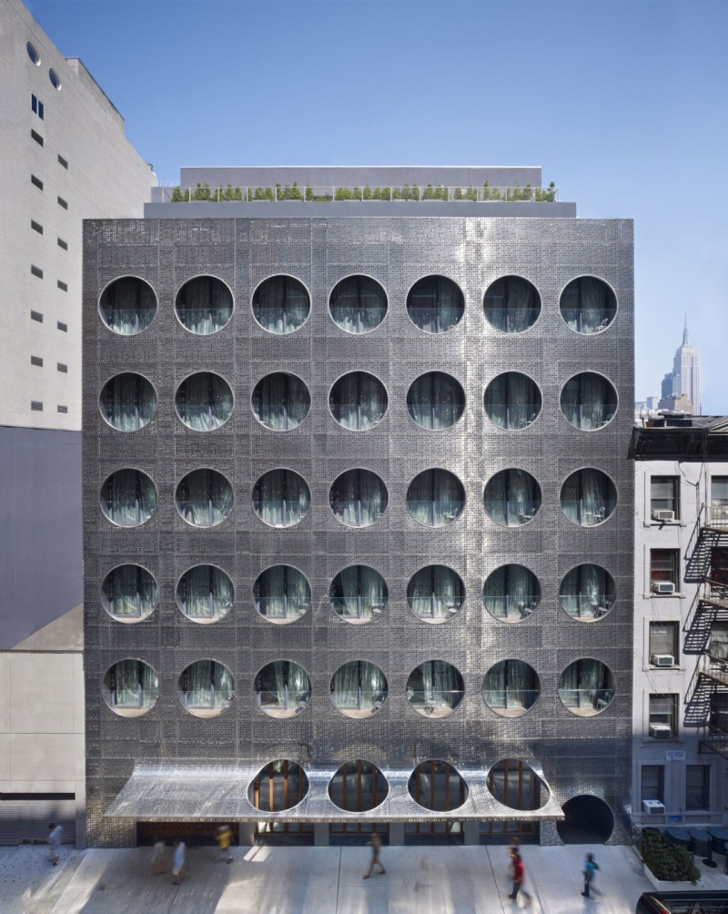 Grey Prefabricated Hotel Spectacular Grey Prefabricated Dream Downtown Hotel In Circle Perforated Wall In High Class Included Greenery Plants At Top Architecture  Amazing Hotel Building With Metal Panels 