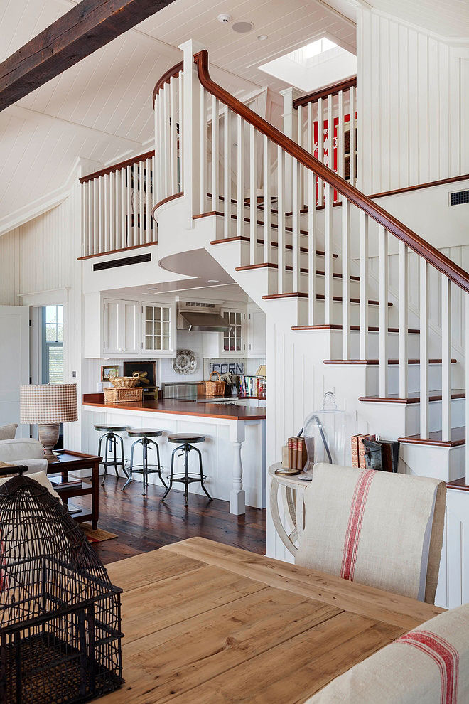 White Staircase Cabinet Steep White Staircase Above Kitchen Cabinet And Kitchen Corner Equipped With Metallic Barstools In Traditional Car Barn Patrick Ahearn Architect Decoration  White Wood Wall Creating Classic Building Construction 