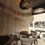 Don Cafe Small Stunning Don Cafe House With Small Wood Coffee Table Also Wavy Interior Wall Veneer Also Chandelier Lamp With Artistic Lamp Installation House Designs  Cafe Interior Design With Calming And Relaxing Vibe 