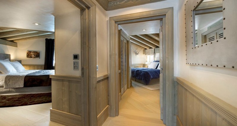 Doorway Design A Traditional Doorway Design To Connect A Bedroom With Other Inside The Chalet White Pearl Use Wooden Door Frame Decoration  Casual Home Design With Cozy Room Atmosphere 