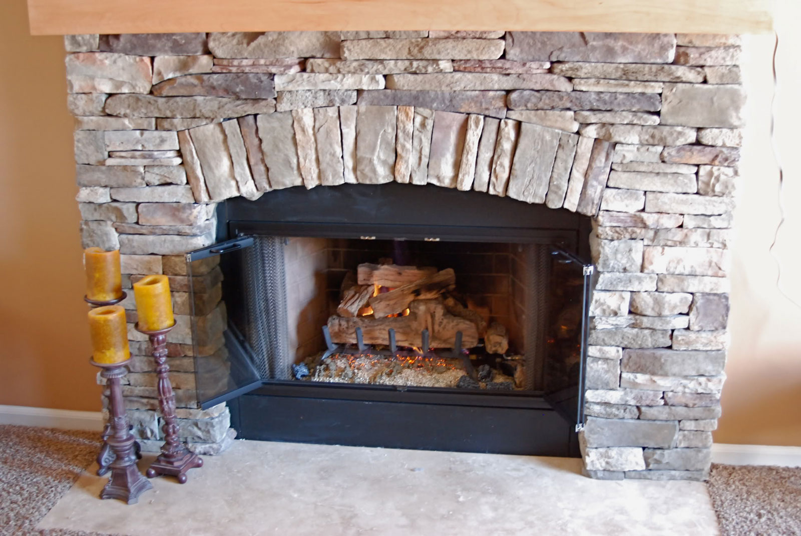 Cobblestone Stone For Unique Cobblestone Stone Fireplace Design For Home Interior Traditional Living Room With Rustic Candlesitcks And Grey Carpet Living Room  Stone Fireplace Design Providing Warmth For Living Room 