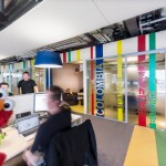 Striped Lining Touch Unpredictable Striped Lining In Colorful Touch For Google Office Interior Design To Match With Grey Flooring And Glass Walling Office  Updated Office In Uplifting Design 