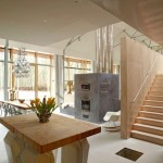 Of Flowers Wooden Vase Of Flowers On The Wooden Table Nearby The Staircase Decoration  Modern House Design In A Sloping Snowy Area With An Opened Concept 