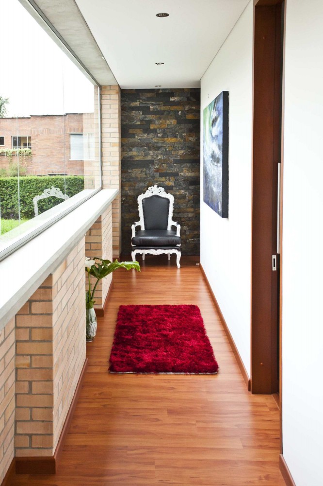 Benefitted Narrow Glass Well Benefitted Narrow Corridor With Glass Window And Wooden Floor Furnished With Classic Style Carved Armchair Residence  Contemporary Residence Engaging With The Nature 