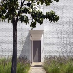 Wall Made Blocks White Wall Made From Concrete Blocks Also Dark Grey Wooden Door Decoration  Modern Minimalist Home In White Color Domination 