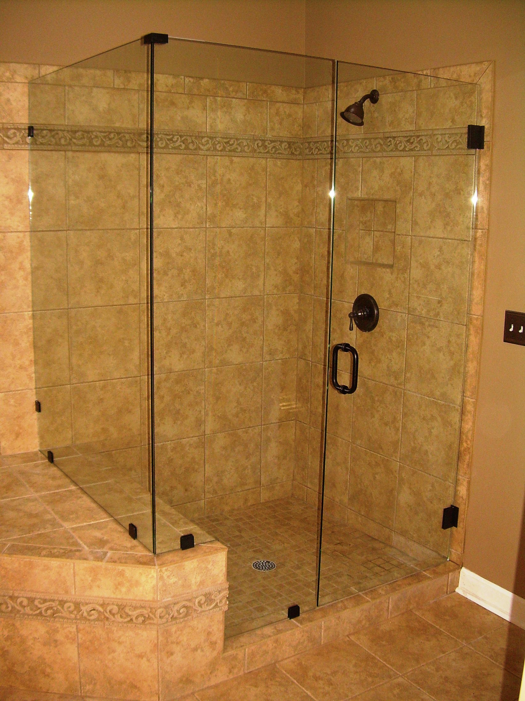 Frameless Shower With Agreeable Frame Less Shower Doors Design With Chocolate Handle Enlightened By Lamps Bathroom Frameless Shower Doors And Pros-Cons You Must Know