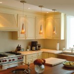 Cabinet Flanking Overlooking Alluring Cabinet Flanking Kitchen Hood Overlooking With Hanging Light Fixture Above Cooking Table Plus Sink  House Designs  Hanging Light Fixtures Creating Positive Ambience In Rooms 
