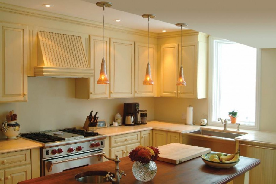 Cabinet Flanking Overlooking Alluring Cabinet Flanking Kitchen Hood Overlooking With Hanging Light Fixture Above Cooking Table Plus Sink  House Designs  Hanging Light Fixtures Creating Positive Ambience In Rooms 