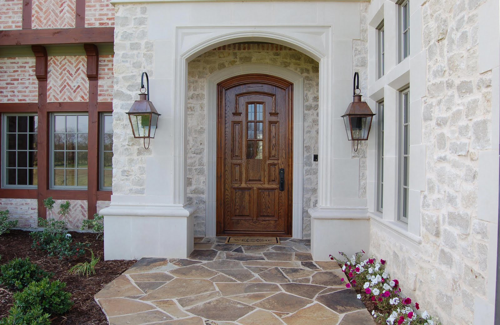 Contemporary Entryway Lantern Amazing Contemporary Entryway With Wall Lantern Lamps With Dark Brown Wooden Front Door Ideas Combined With Glass Accents And Completed With Beautiful Flowers On Side Entryway Exterior Front Door Ideas: The “Face” Of The House