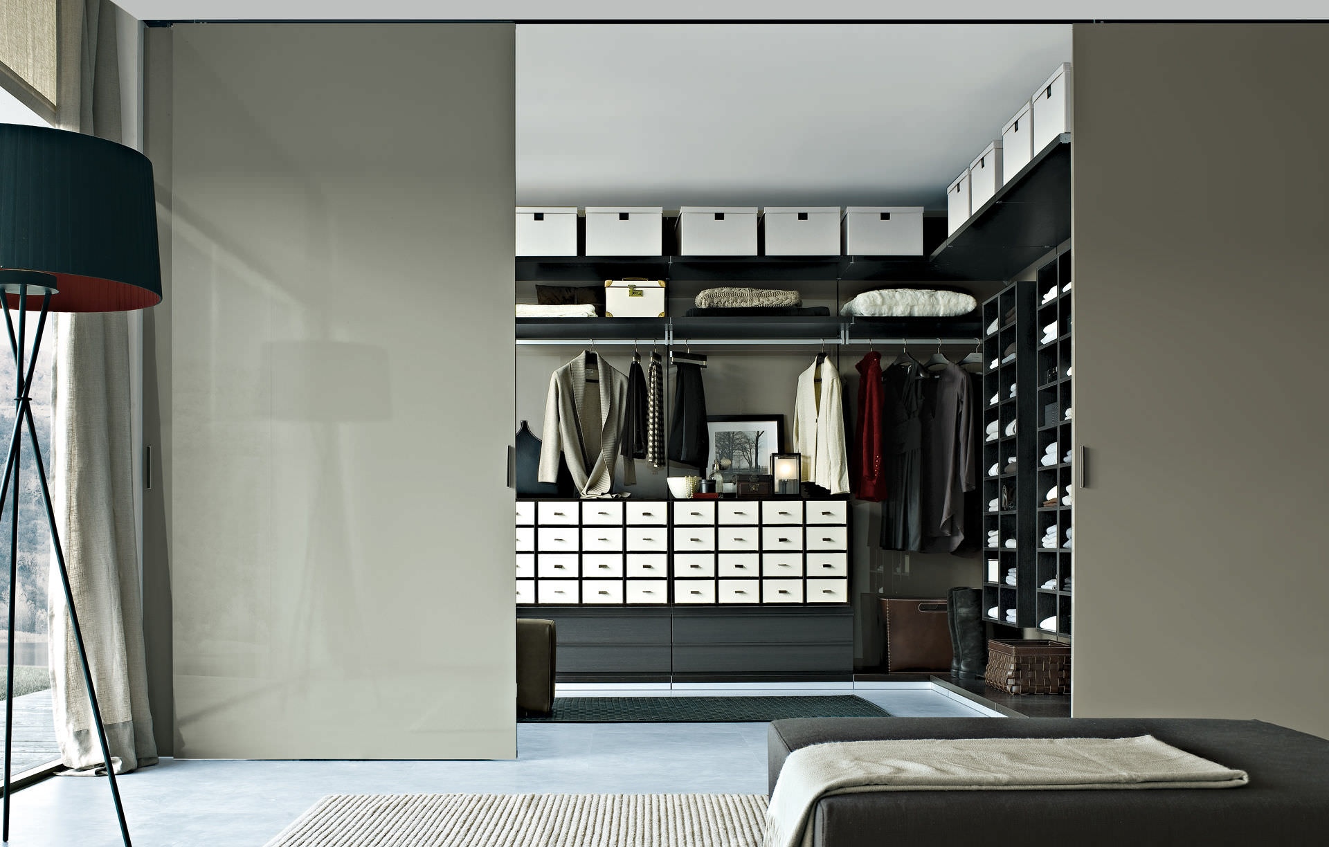 Modern Black In Amazing Modern Black White Walk In Closet Ideas With Sleek Sliding Doors Completed With Clothes Rack And Cabinet Furnished With Flooring Stand Lamp Closet Walk In Closet Ideas: Enjoying Private Collection