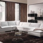 White Sectional In Amazing White Sectional Sofa Bed In Living Room Design With Sleek Round Table On Brown Soft Rug Furnished With Pedestal Nightstand And Completed With Crystal Pendant Lamps Living Room Stylish And Simply Living Room Design