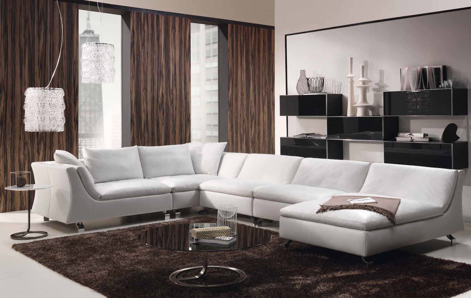 White Sectional In Amazing White Sectional Sofa Bed In Living Room Design With Sleek Round Table On Brown Soft Rug Furnished With Pedestal Nightstand And Completed With Crystal Pendant Lamps Living Room Stylish And Simply Living Room Design