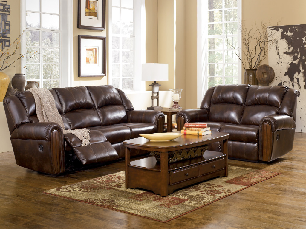 Dark Brown With Appealing Dark Brown Reclining Sofa With Loveseat Of Living Room Furniture Sets Furnished With Wooden Table On Rug And Completed With Candle Holder On Nightstand Furniture The Best Living Room Furniture Sets
