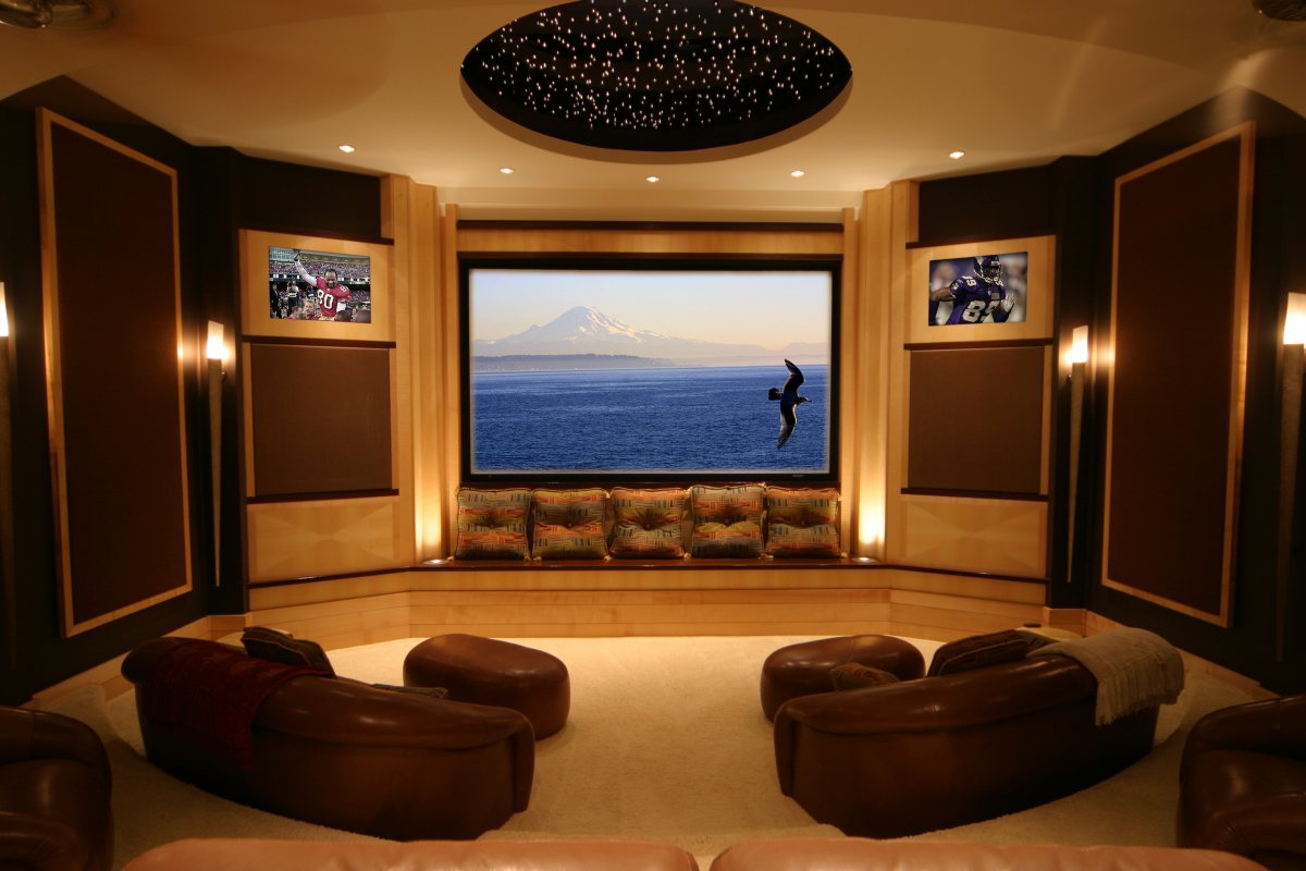 Media Room Couches Artistic Media Room Ideas With Couches Flat Screened TV Two Posters Of NFL Players In A Dim Lighted Room Decoration Decorative Media Room Ideas In Contemporary Design