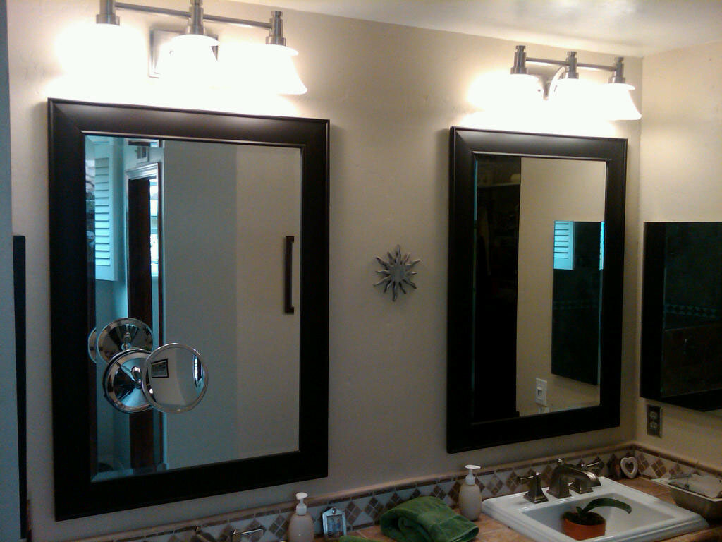 Minimalist Bathroom Sconce Astounding Minimalist Bathroom With Wall Sconce Lighting And Sink Applying Double Handle Faucet Furnished With Two Mirrors And Completed By Bathroom Fixtures Bathroom Decorating Bathroom With Bathroom Fixtures