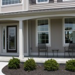 Terrace In Chairs Astounding Terrace In Grey With Chairs And Round Table Completed With Black Front Door Ideas Combined With Glass Screens And Completed With Small Garden Front Yard Exterior Front Door Ideas: The “Face” Of The House