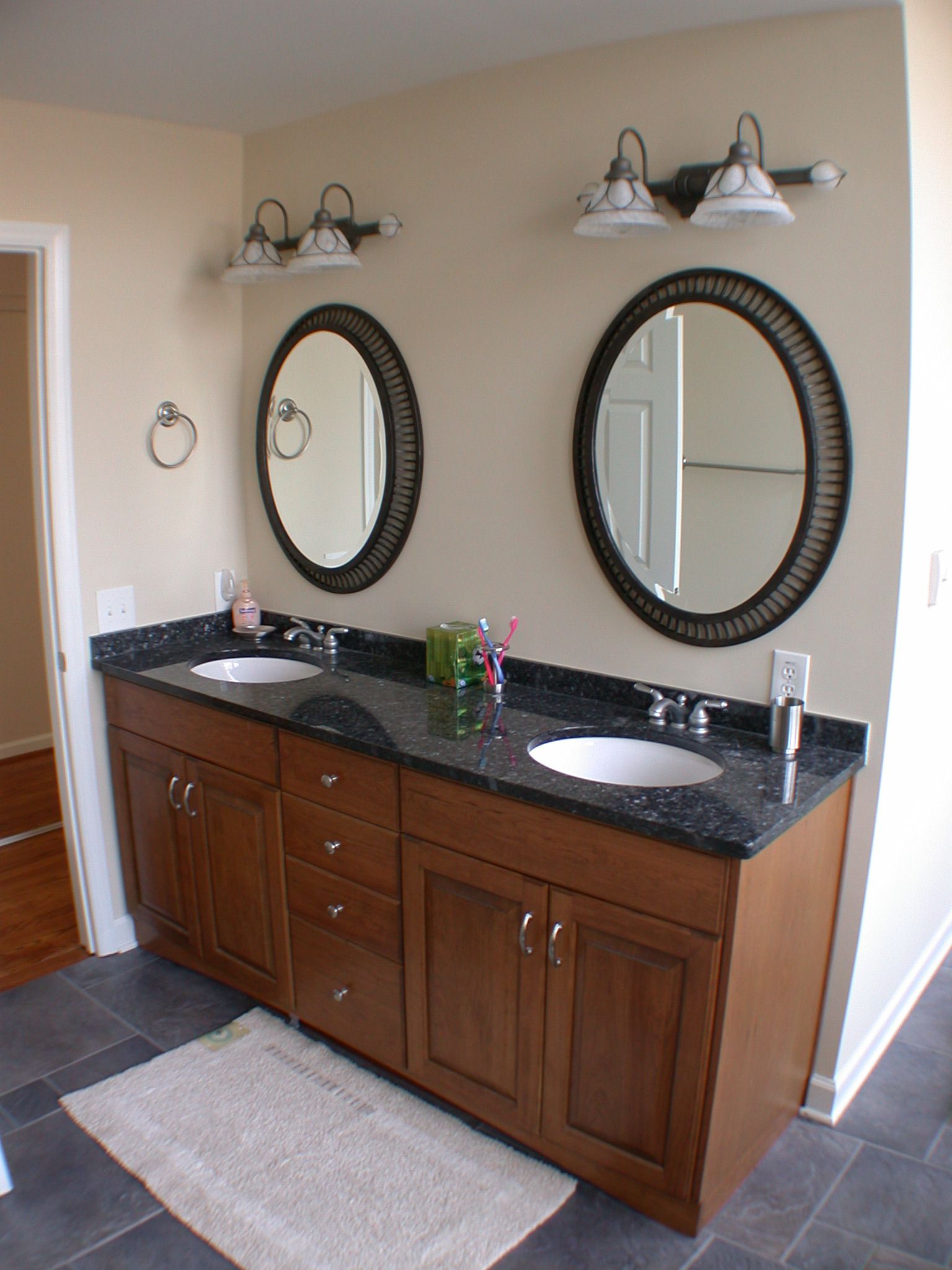 Bathroom Plan Sink Attractive Bathroom Plan Uses Double Sink Vanity With Marble Countertop Under Twin Circular Mirror And Branched Lamps Bathroom Double Sink Vanity Application For Spacious Bathroom Design