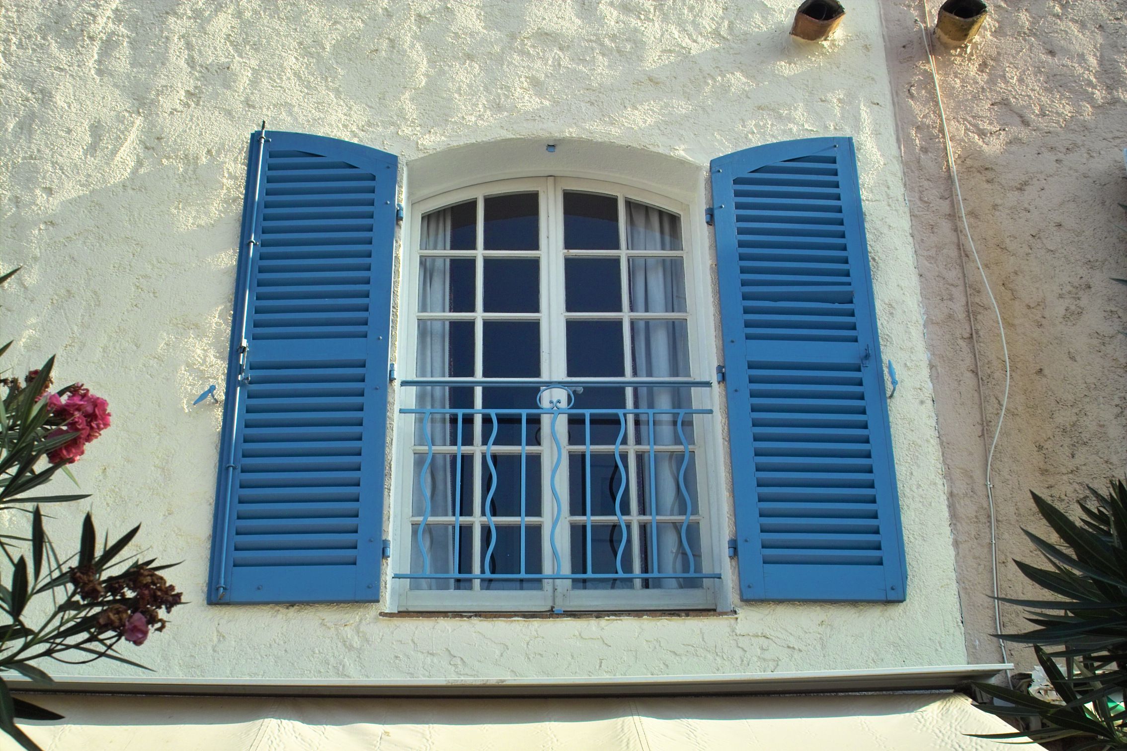 Exterior Window Blue Attractive Exterior Window Shutters In Blue Color And French Design For White Arched Windows Exterior Exterior Window Shutters With Maximum Functional Features