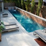 Backyard Pool Plus Awesome Backyard Pool With Waterfalls Plus Cozy Gray Outdoor Chaise Lounge Design And Wooden Privacy Fence Idea Outdoor  Surprising Designs Of Outdoor Chaise Lounge 