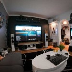 Black And Living Awesome Black And White Themed Living Room Theater Decor Ideas With Modern Home Theater Setup Idea And Futuristic Wall Mounted Flat TV Design Also Rustic Laminate Wood Flooring Ideas Living Room 20 Stylish Living Room Theater For The Beautiful Media Rooms