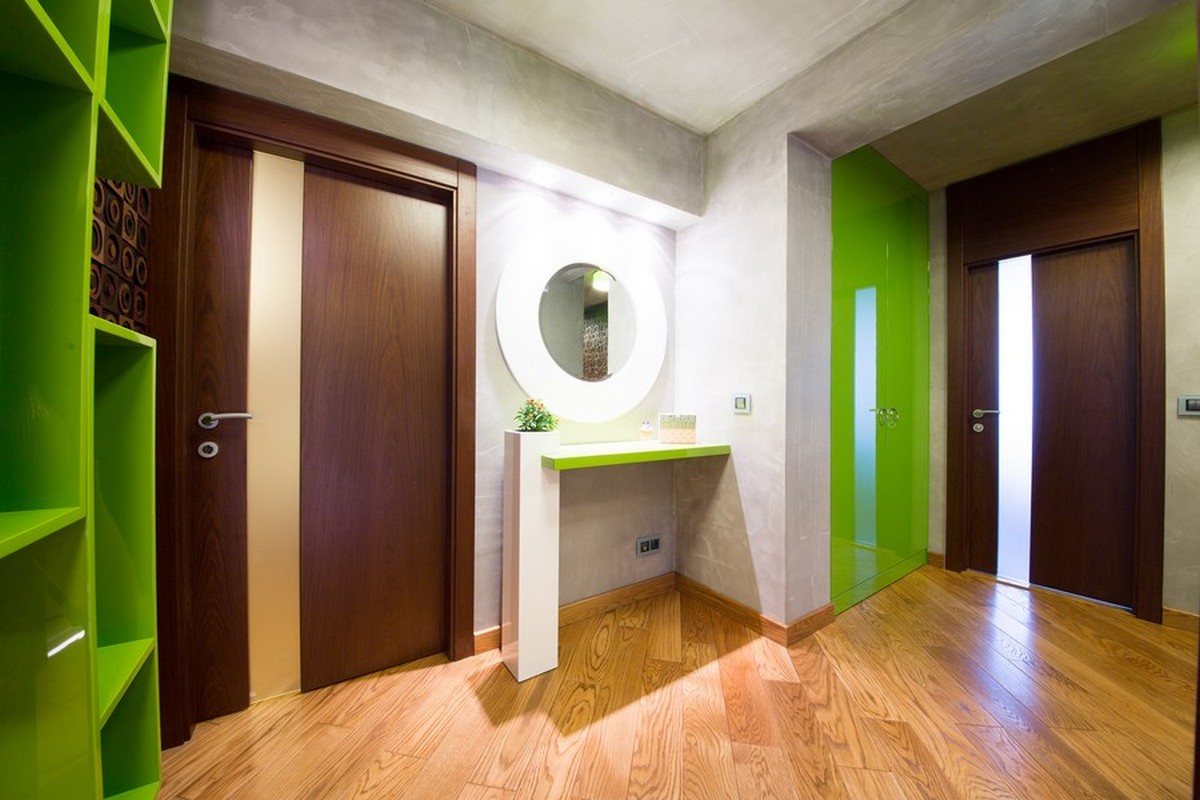 Entrance With Design Awesome Entrance With Wooden Flooring Design Furnished With Green Cabinets And Wall Table With Round Mirror Frame Also Completed With Dark Brown Interior Wood Doors Interior Design The Possible Combination Of The Interior Wood Doors