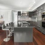 Silver Kitchen Island Awesome Silver Kitchen With Kitchen Island Equipped By Basin Sink And Pedestal High Chairs Also Completed With Modern Kitchen Cabinets Furnished With Electric Ovens Kitchen Modern Kitchen Cabinets Design Inspiration