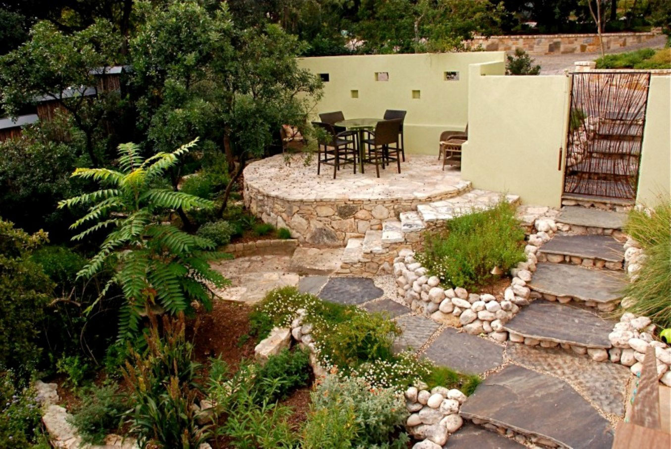 Patio Idea Stone Backyard Patio Idea Present Beautiful Stone Walkway And Stairs Feat Cozy Black Outdoor Furniture Set Design Backyard  Decorating Backyard Patio Ideas For Lovely Family And Enhancing Your House Design 