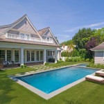 Pool Design English Backyard Pool Design Of An English Country House With Green Grassed Backyard Cushioned Pool Side Chairs And Hot Tub Backyard Appealing Backyard Pool Designs For Contemporary Residences