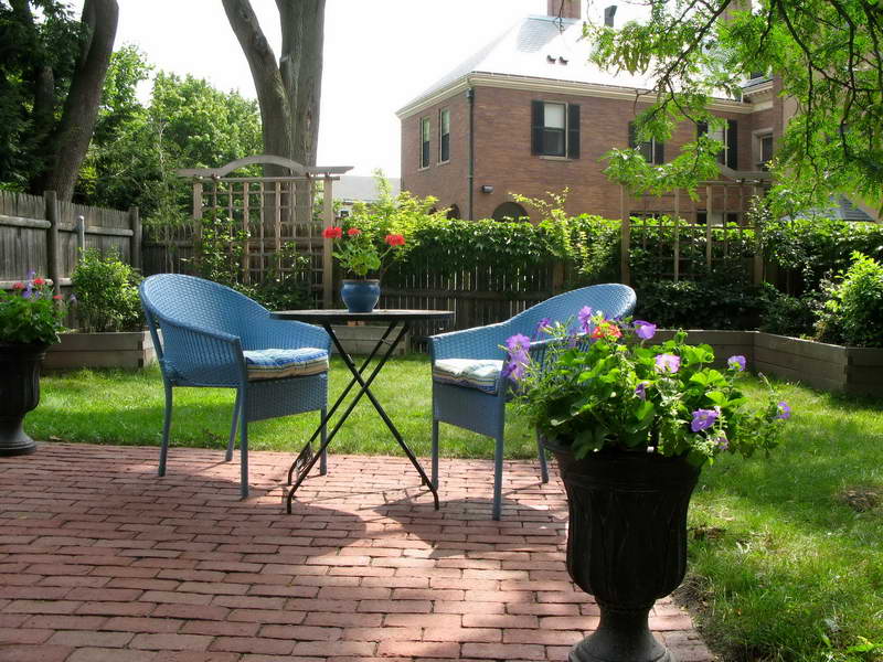 Blue Wicker Coffe Beauteous Blue Wicker Chair Plus Coffee Table Near Planters Stand On Brick Tiles In Small Backyard Ideas Backyard Small Backyard Ideas For You Who Love Simplicity