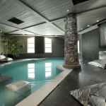Swimming Pool With Beautiful Indoor Swimming Pool Design Decorated With Modern Tropical Style Using Stone Pillar And Minimalist Furniture Design Pool Indoor Swimming Pool Covered In Awesomeness