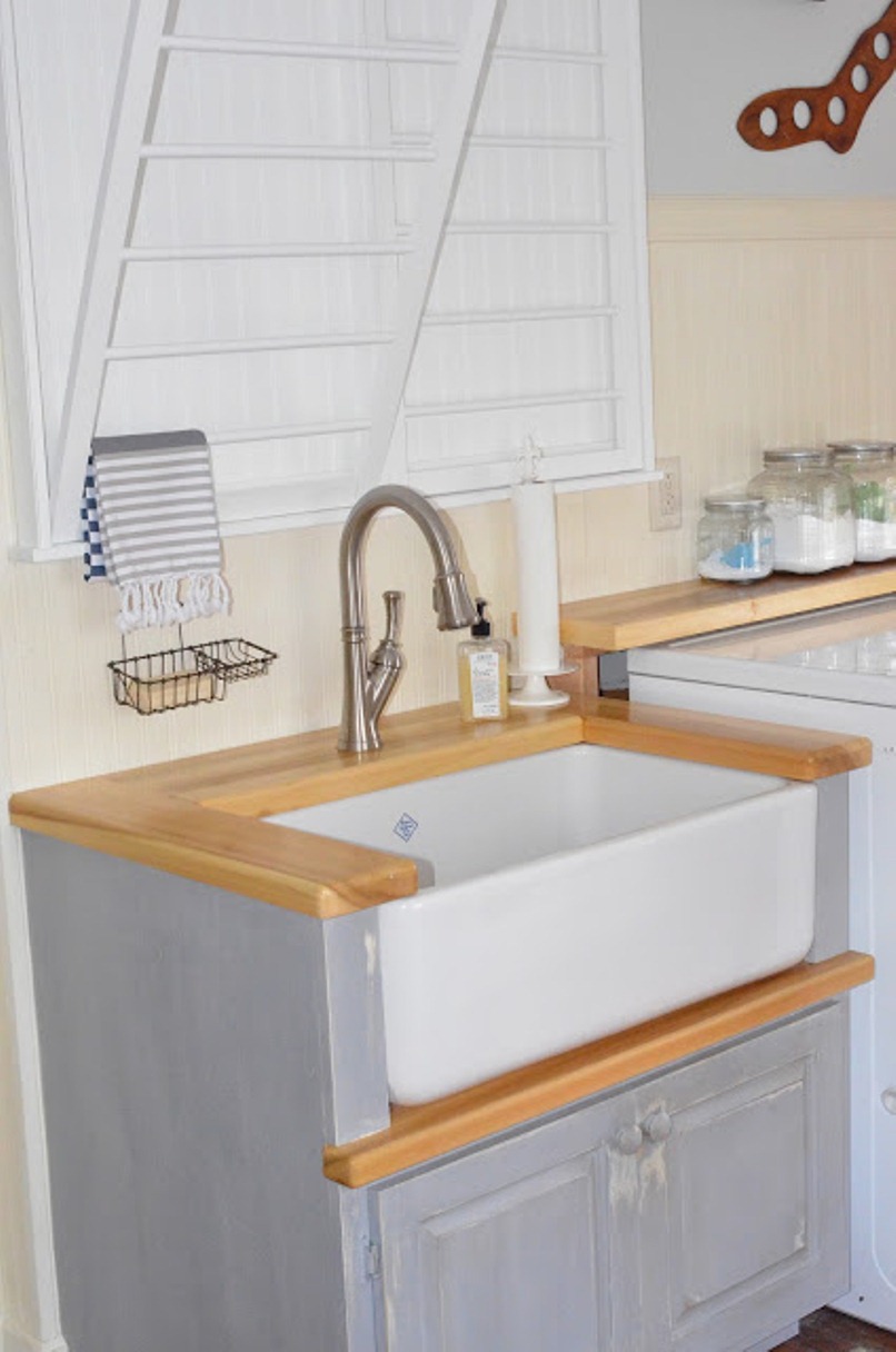 Laundry Room Gray Best Laundry Room Sink With Gray Cabinet Underneath Feat Hanging Wire Soap Rack And Glass Product Organizers Interior Design  Laundry Room Sinks That Are Functional As Well As Decorative 