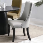 Table And Dining Black Table And Nice Upholstered Dining Chairs On Floor Tile Plus White Wall Paint Dining Room Upholstered Dining Chairs For Perfect Contemporary Looks