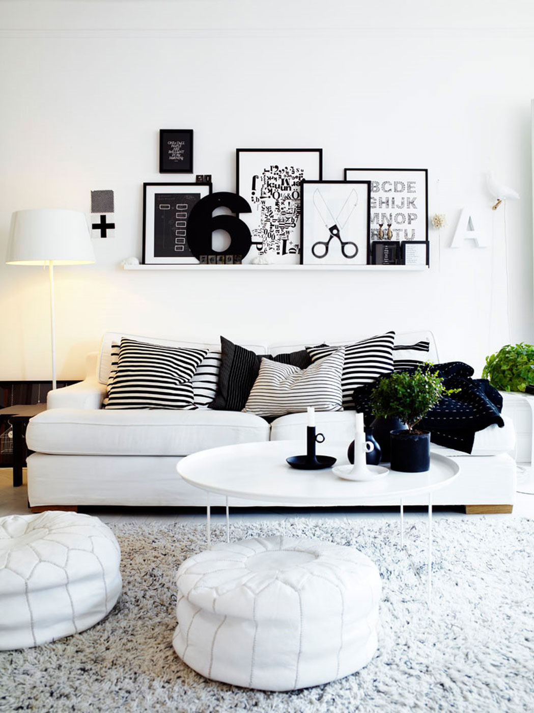 White Home For Black White Home Interior Design For Small Apartments Ideas With Modern Round Plastic Tea Table Design And White Colored Feather Carpet Ideas Also Inspiring Bed Sofa Furniture Design Furniture Selecting Beautiful Furniture For Home Interior Design