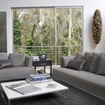 Grey Sofa Of Breathtaking Grey Sofa And Loveseat Of Modern Living Room Matched With Soft Rug And White Table Furnished With Nightstand And Completed With Wall Room Decorations Living Room Modern Living Room Inspiration For Your Rich Home Decor