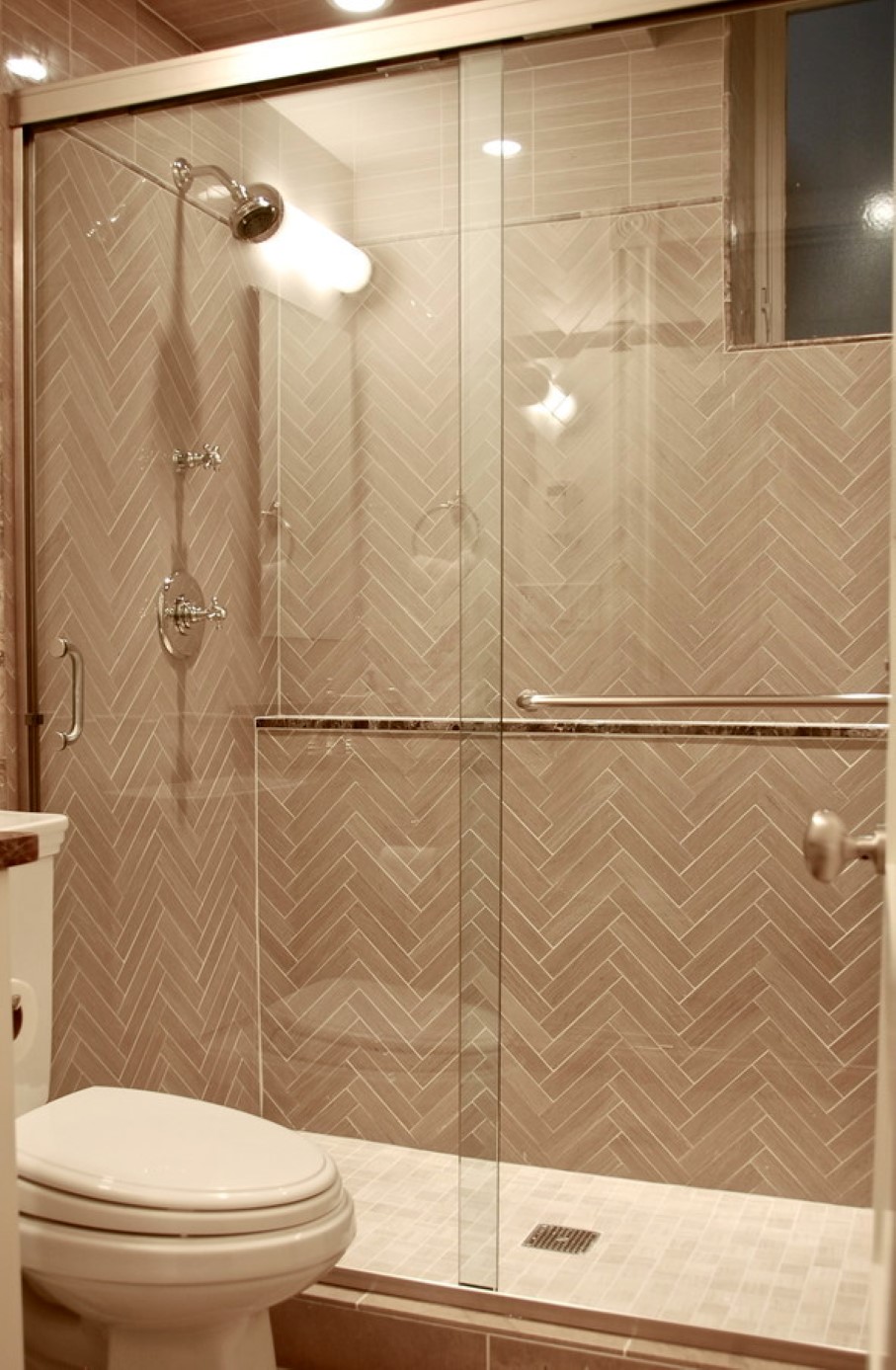 Herringbone Bathroom Pattern Captivating Herringbone Bathroom Wall Tile Pattern Feat Smart Sliding Glass Shower Door And Two Piece Toilet Bathroom  Sliding Door Model For Exclusive Shower Time 