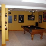 Basement Ideas Wall Charming Finished Basement Ideas With Yellow Wall Color And Concrete Flooring Design Combined With Billiard Table In Modern Style Basement Finished Basement Ideas With Decorative Style
