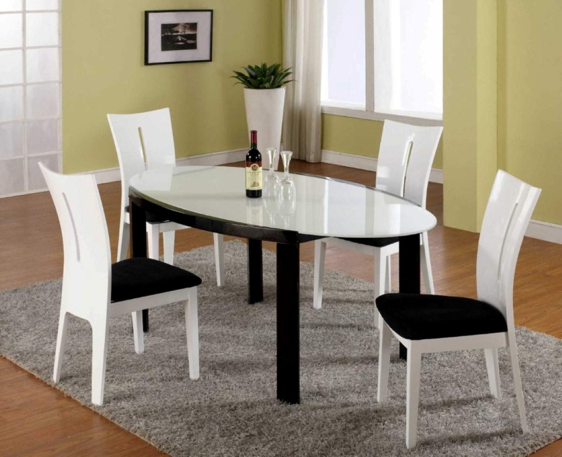 Black And Room Contemporary Black And White Dining Room Set With Oval Table Idea Plus 4 Armless Chairs Feat Comfy Rectangular Rug Design Dining Room  Having Good Time In A Contemporary Dining Room Sets 