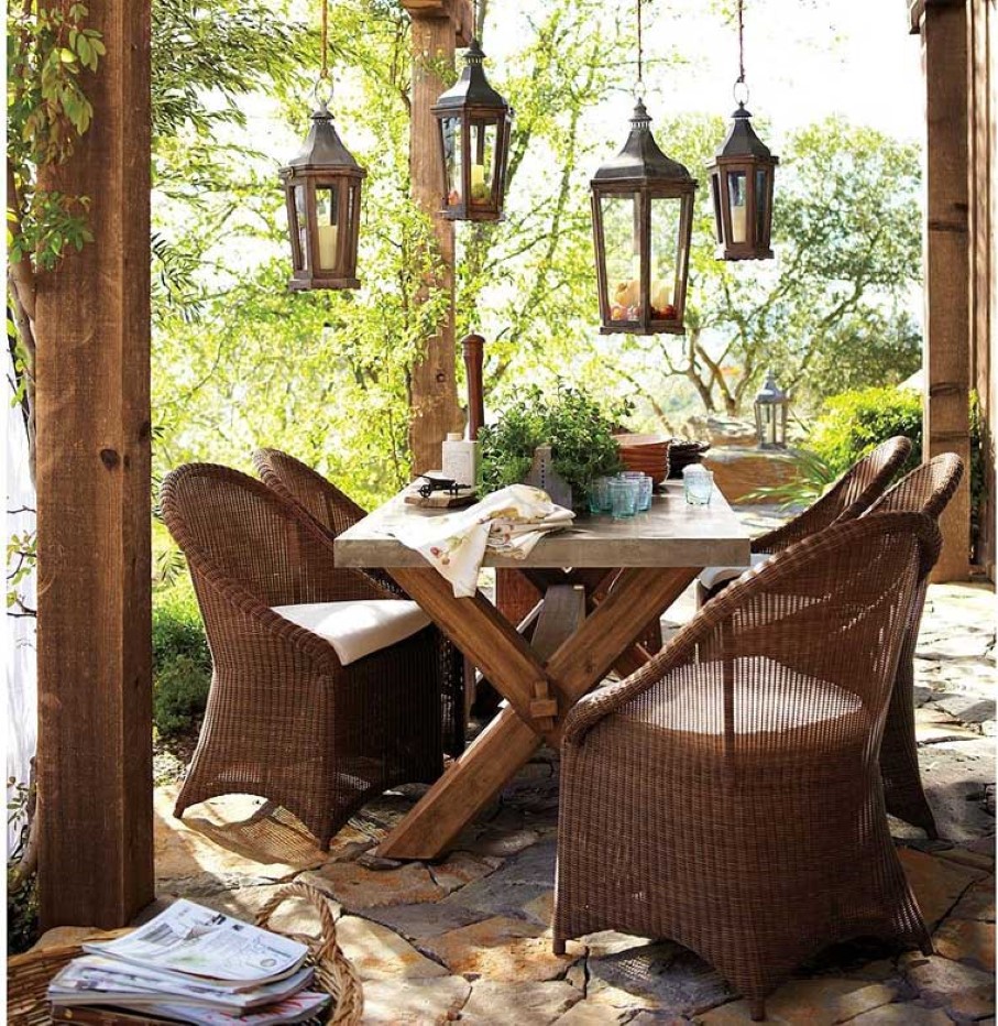 Lantern Pendant Rustic Contemporary Lantern Pendant Lamps Above Rustic Outdoor Dining Table With Brown Rattan Armchairs Set On Stoned Floor Outdoor  Getting Charming Outdoor Decoration By Inspiring Rustic Furniture 