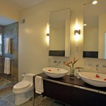 Bathroom Lighting Contemporary Cool Bathroom Lighting Fixtures In Contemporary Bathroom Completed By Vanity With Double Bowl Sink And Dual Mirror Furnished With Toilet Seat And Towel Rack Bathroom The Greatnesses Of Bathroom Lighting Fixtures