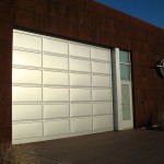 Modern Garage With Cool Modern Garage Doors Design With White Color Made From Wooden Material In Brown Brick Wall Decoration Decoration Fascinating Modern Garage Doors Used In Remarkable Designs