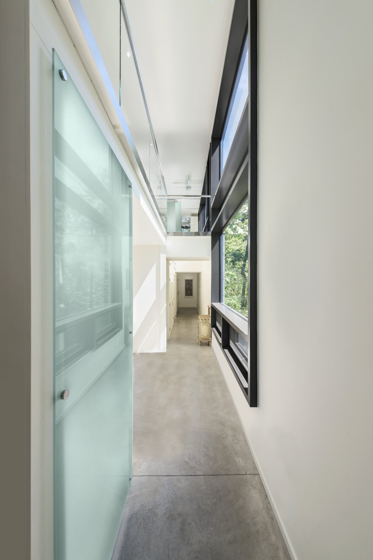 Modern Hill With Corridor Modern Hill House Design With Glass Door Exposed Concrete Floor Tiles Plus White Interior Color Decorating Ideas Architecture Stylish Contemporary Home With A Concrete Brick Facade