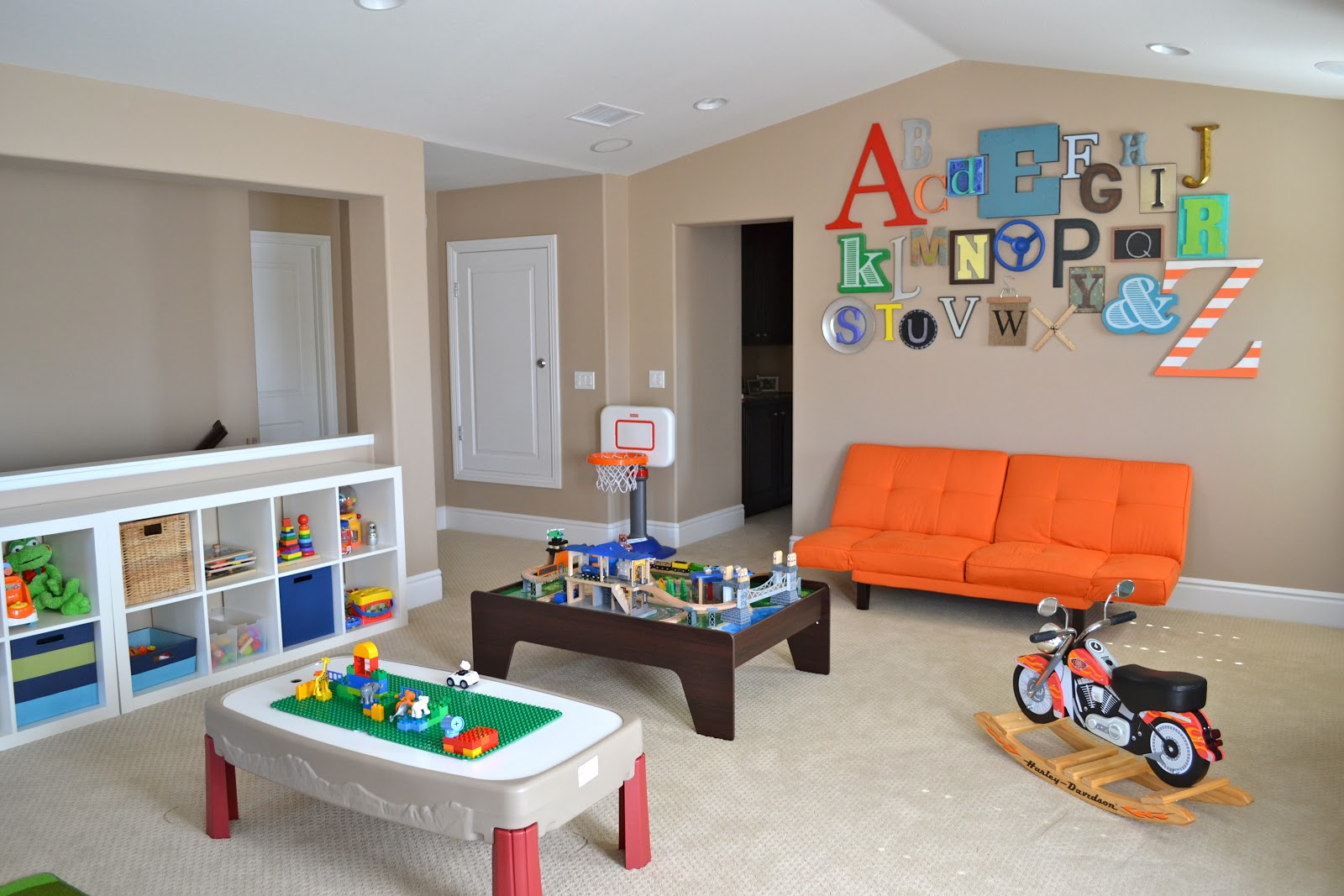 Kids Chat Orange Dazzling Kids Chat Rooms With Orange Loveseat And Glass Table Decorated With Wall Decorations And Furnished With White Cabinet For Toys Storage Kids Room Design And Furniture Of Kids Chat Rooms