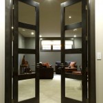 Black Interior For Double Black Interior Doors Installed For Living Room With Cozy Couch Under Small Lamp Interior Design Awesome Black Interior Doors Completing Elegant Room Design