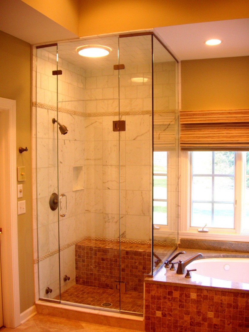 Small Bathroom Clear Enchanting Small Bathroom Remodel With Clear Glass Shower Bath Furnished By Shower Head And Ring Towel Rack And Completed With Double Handle Classic Faucet On Bathtub Side Bathroom Comfortable Small Bathroom Ideas For Washing In Charming Style