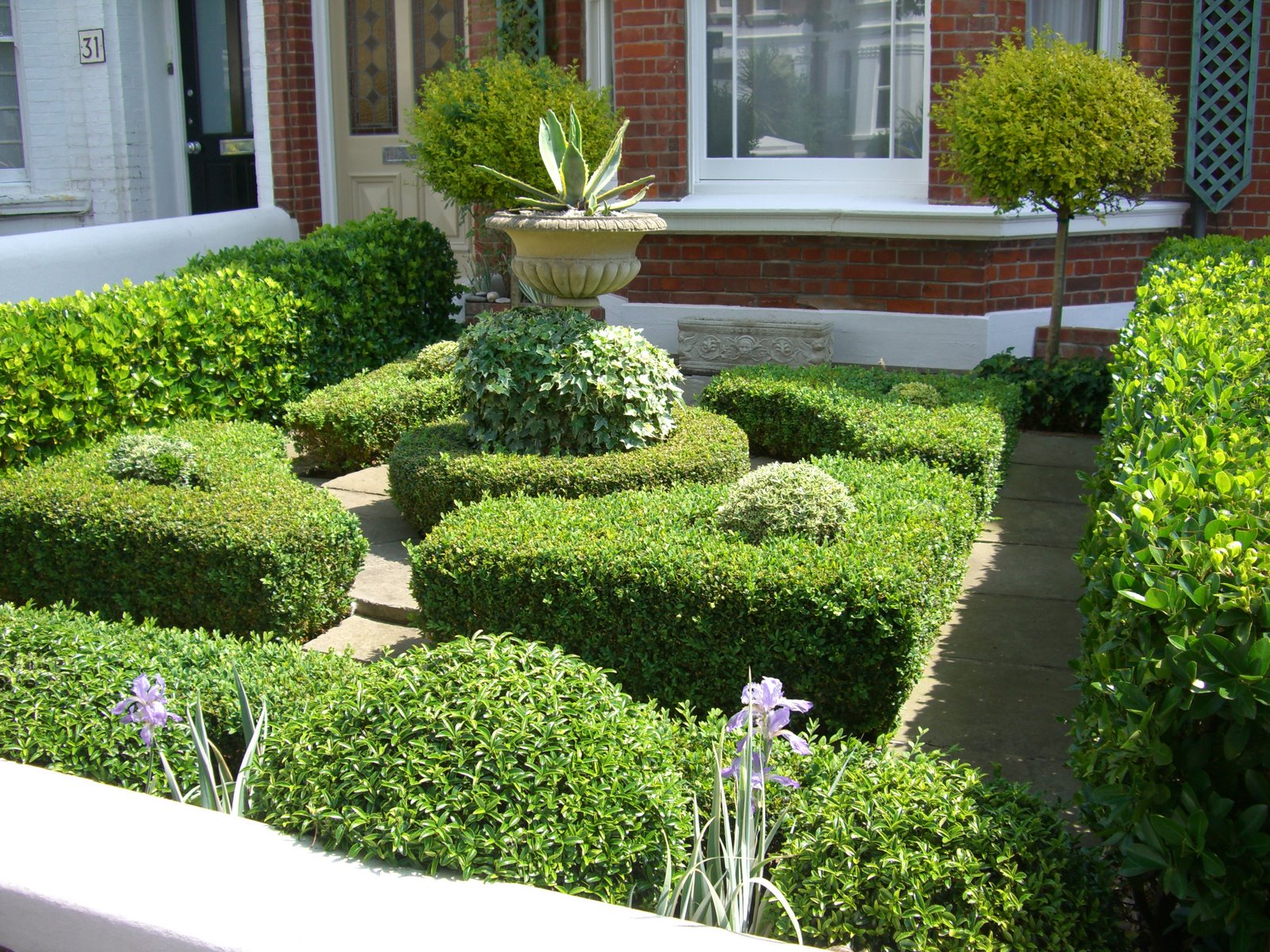Small Formal Ideas Enchanting Small Formal Garden Design Ideas Completed With Various Green Plants And Trees Furnished With Flowers And Vase Plant Decor Garden Garden Design Ideas As The Additional Decoration For Enhancing House