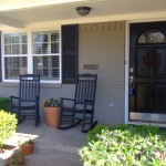 Design In Houses Excellent Patio Design In Painted Brick Houses Using Brown Wall Color Style Completed With Traditional Rocking Chair Painted Brick Houses For Your Colorful Living Space