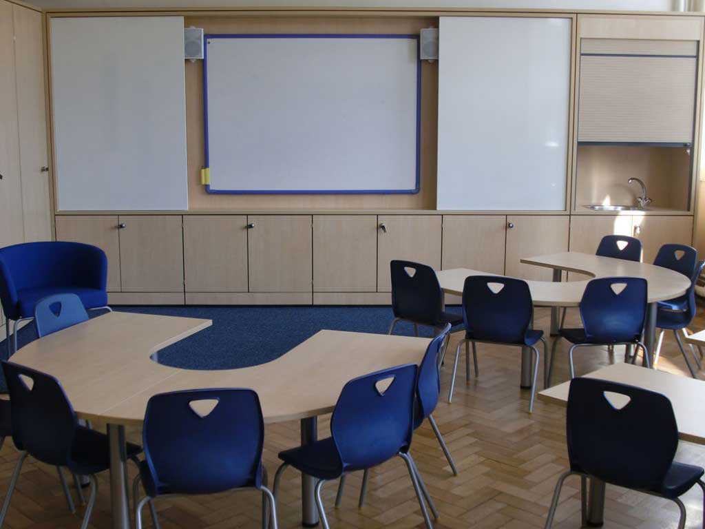 Small Class School Excellent Small Class Interior Design School With Modern Blue Chair Color Idea And Round Desk School Furniture Sets Plus Whiteboard Design Interior Schools Decorating Interior Design 15 Captivating Interior Design Schools With Vibrant And Colorful Interiors